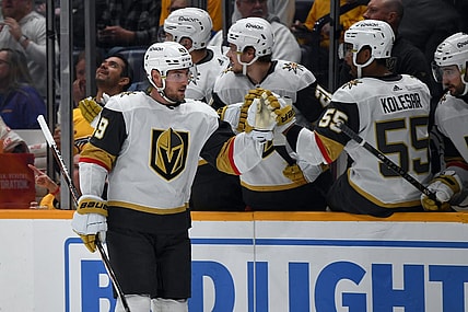 Mar 26, 2024; Nashville, Tennessee, USA; Vegas Golden Knights center Ivan Barbashev (49) celebrates with teammates after a goal during the first period against the Nashville Predators at Bridgestone Arena. Mandatory Credit: Christopher Hanewinckel-USA TODAY Sports
