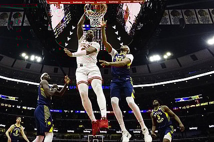 Mar 27, 2024; Chicago, Illinois, USA; Chicago Bulls center Andre Drummond (3) dunks on Indiana Pacers center Myles Turner (33) during the first quarter at United Center. Mandatory Credit: David Banks-USA TODAY Sports