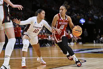 Mar 29, 2024; Portland, OR, USA; NC State Wolfpack guard Aziaha James (10) drives to the basket during the first half against Stanford Cardinal guard Talana Lepolo (10) in the semifinals of the Portland Regional of the 2024 NCAA Tournament at the Moda Center at the Moda Center. Mandatory Credit: Troy Wayrynen-USA TODAY Sports