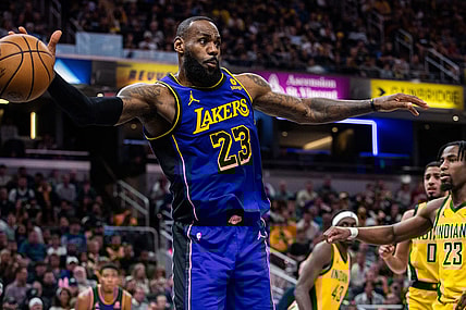 Mar 29, 2024; Indianapolis, Indiana, USA; Los Angeles Lakers forward LeBron James (23) passes the ball  in the second half against the Indiana Pacers at Gainbridge Fieldhouse. Mandatory Credit: Trevor Ruszkowski-USA TODAY Sports