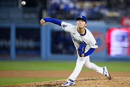 Mar 30, 2024; Los Angeles, California, USA; Los Angeles Dodgers starting pitcher Yoshinobu Yamamoto (18) throws out a pitch during the fourth inning against the St. Louis Cardinals at Dodger Stadium. Mandatory Credit: Kelvin Kuo-USA TODAY Sports