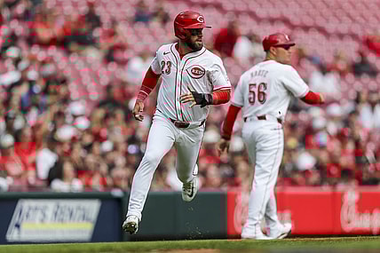 Mar 31, 2024; Cincinnati, Ohio, USA; Cincinnati Reds designated hitter Nick Martini (23) scores on a double hit by center fielder Will Benson (30) in the third inning against the Washington Nationals at Great American Ball Park. Mandatory Credit: Katie Stratman-USA TODAY Sports