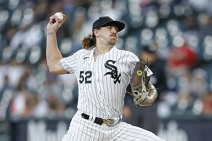 Sep 30, 2023; Chicago, Illinois, USA; Chicago White Sox starting pitcher Mike Clevinger (52) delivers a pitch against the San Diego Padres during the first inning at Guaranteed Rate Field. Mandatory Credit: Kamil Krzaczynski-USA TODAY Sports