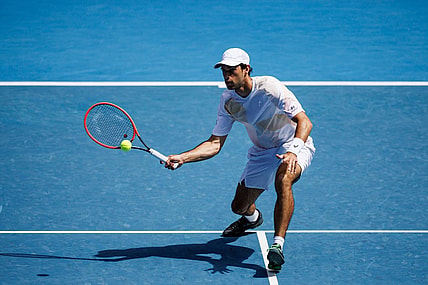 Jan 22, 2024; Melbourne, Victoria, Australia; Nuno Borges of Portugal hits a shot against Daniil Medvedev of Russia in the fourth round of the men   s singles at the Australian Open in MelbourneMandatory Credit: Mike Frey-USA TODAY Sports