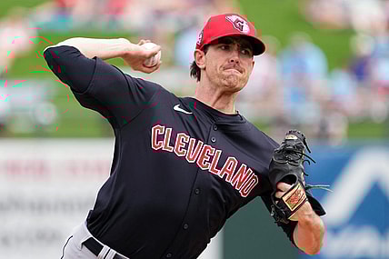 Mar 12, 2024; Surprise, Arizona, USA; Cleveland Guardians starting pitcher Shane Bieber (57) bats against the Texas Rangers during the second inning at Surprise Stadium. Mandatory Credit: Joe Camporeale-USA TODAY Sports