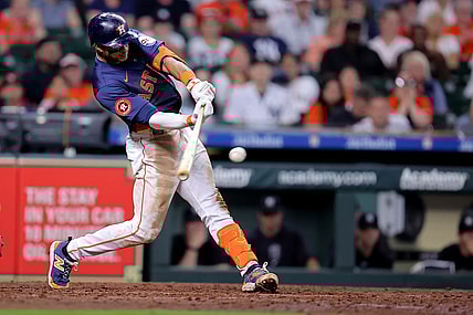 Mar 31, 2024; Houston, Texas, USA; Houston Astros shortstop Jeremy Pena (3) hits a single to right field against the New York Yankees during the ninth inning at Minute Maid Park. Mandatory Credit: Erik Williams-USA TODAY Sports