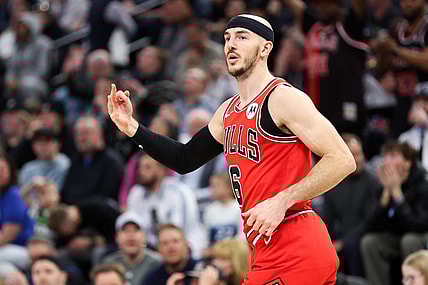 Mar 31, 2024; Minneapolis, Minnesota, USA; Chicago Bulls guard Alex Caruso (6) celebrates his three-point basket against the Minnesota Timberwolves during the second half at Target Center. Mandatory Credit: Matt Krohn-USA TODAY Sports