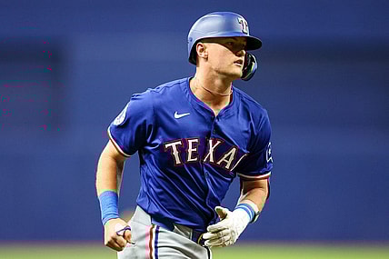 Apr 1, 2024; St. Petersburg, Florida, USA;  Texas Rangers third baseman Josh Jung (6) runs the bases after hitting a three run home run against the Tampa Bay Rays in the first inning at Tropicana Field. Mandatory Credit: Nathan Ray Seebeck-USA TODAY Sports