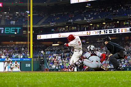 Apr 2, 2024; Philadelphia, Pennsylvania, USA; Philadelphia Phillies first baseman Bryce Harper (3) hits a four RBI grand slam during the seventh inning against the Cincinnati Reds at Citizens Bank Park. Mandatory Credit: Bill Streicher-USA TODAY Sports