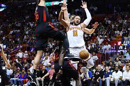 Apr 2, 2024; Miami, Florida, USA; New York Knicks guard Jalen Brunson (11) reacts after driving to the basket against Miami Heat forward Caleb Martin (16) during the first quarter at Kaseya Center. Mandatory Credit: Sam Navarro-USA TODAY Sports