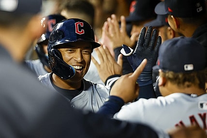 Apr 2, 2024; Seattle, Washington, USA; Cleveland Guardians designated hitter Bo Naylor (23) celebrates in the dugout after hitting a two-run home run against the Seattle Mariners during the fourth inning at T-Mobile Park. Mandatory Credit: Joe Nicholson-USA TODAY Sports