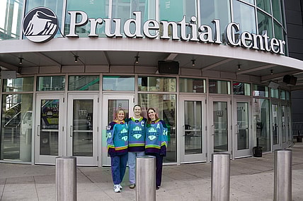 New York Sirens alternate captains Sarah Fillier and Jaime Bourbonnais with captain Micah Zandee-Hart.