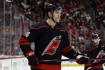 Carolina Hurricanes' Mikko Rantanen (96) waits for a face-off against the Chicago Blackhawks during the second period of an NHL hockey game in Raleigh, N.C., Sunday, Feb. 2, 2025. (AP Photo/Karl DeBlaker)