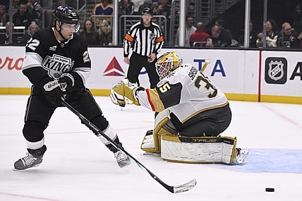 Los Angeles Kings left wing Kevin Fiala (22) skates to the puck with Vegas Golden Knights goaltender Ilya Samsonov (35) defending during the second period of an NHL hockey game in Los Angeles, Monday, Feb. 24, 2025. (AP Photo/Alex Gallardo)