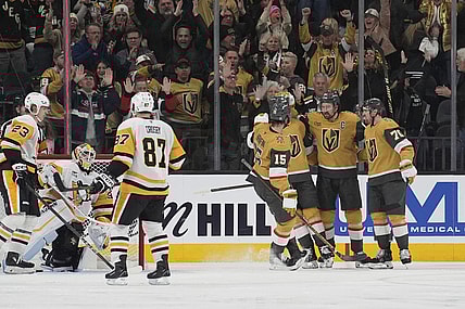 Vegas Golden Knights right wing Mark Stone, second from right, celebrates after scoring against the Pittsburgh Penguins during the third period of an NHL hockey game Friday, March 7, 2025, in Las Vegas. (AP Photo/John Locher)
