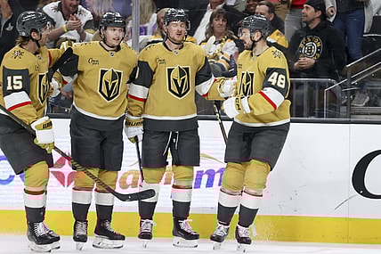 Vegas Golden Knights defenseman Noah Hanifin (15), left wing Pavel Dorofeyev (16), center Jack Eichel (9) and center Tomas Hertl (48) celebrate after Dorofeyev's first goal during the second period of an NHL hockey game against the Boston Bruins Thursday, March 20, 2025, in Las Vegas. (AP Photo/Ian Maule)