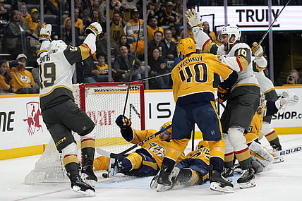Vegas Golden Knights right wing Reilly Smith (19) scores against the Nashville Predators during the third period of an NHL hockey game Saturday, March 29, 2025, in Nashville, Tenn. (AP Photo/Mark Humphrey)