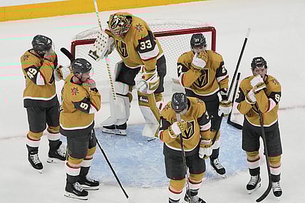Vegas Golden Knights players react after losing to the Edmonton Oilers in overtime of Game 5 of a second-round NHL hockey playoff series Wednesday, May 14, 2025, in Las Vegas. (AP Photo/John Locher)