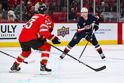 MONTREAL, QC - FEBRUARY 15: Team USA forward Jack Eichel (9) plays the puck against Team Canada forward Sam Reinhart (13) during a 4 Nations Face-Off game between Team USA and Team Canada on February 15, 2025, at Bell Centre in Montreal, QC (Photo by David Kirouac/Icon Sportswire)