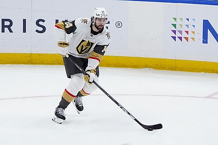 ELMONT, NY - FEBRUARY 04: Vegas Golden Knights Defenseman Nicolas Hague (14) skates with the puck during the third period of the National Hockey League game between the Vegas Golden Knights and the New York Islanders on February 4, 2025, at UBS Arena in Elmont, NY. (Photo by Gregory Fisher/Icon Sportswire)