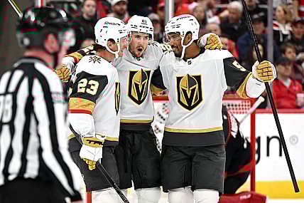 RALEIGH, NC - OCTOBER 28: Vegas Golden Knights center Brett Howden (21) celebrates with Vegas Golden Knights left wing Cole Reinhardt (23) and Vegas Golden Knights right wing Keegan Kolesar (55) after scoring a goal during the NHL game between the Vegas Golden Knights and the Carolina Hurricanes on October 28, 2025 at Lenovo Center in Raleigh, North Carolina. (Photo by Katherine Gawlik/Icon Sportswire)