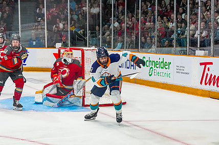 New York Sirens forward Elle Hartje skates away from Ottawa Charge goalie Gwyneth Philips during a 5-1 loss at TD Place.