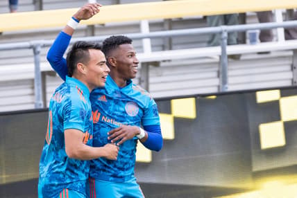 May 29, 2021; Columbus, Ohio, USA; Columbus Crew SC midfielder Luis Diaz (right) celebrates his goal with midfielder Lucas Zelarayan (left) in the first half against the Toronto FC at Historic Crew Stadium. Mandatory Credit: Trevor Ruszkowski-USA TODAY Sports