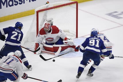 Jun 28, 2021; Tampa, Florida, USA; Montreal Canadiens goaltender Carey Price (31) makes a save between Tampa Bay Lightning center Brayden Point (21) and center Steven Stamkos (91) in the second period of game one of the 2021 Stanley Cup Final at Amalie Arena. Mandatory Credit: Douglas DeFelice-USA TODAY Sports