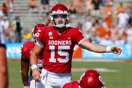 Oct 10, 2020; Dallas, Texas, USA; Oklahoma Sooners quarterback Tanner Mordecai (15) calls the signals against the Texas Longhorns during the third quarter of the Red River Showdown at Cotton Bowl. Mandatory Credit: Andrew Dieb-USA TODAY Sports