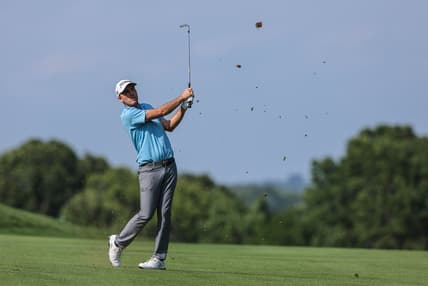 Jun 27, 2021; Cromwell, Connecticut, USA; Russell Henley plays his shot from the 14th fairway during the final round of the Travelers Championship golf tournament. Mandatory Credit: Vincent Carchietta-USA TODAY Sports