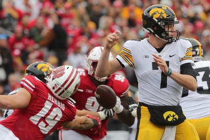 Wisconsin linebacker Nick Herbig (19) strips Iowa quarterback Spencer Petras (7) of the ball during the second quarter of their game on Saturday, Oct. 30, 2021, at Camp Randall Stadium in Madison. Wisconsin recovered the ball.

Mjs Uwgrid31 1 Jpg Uwgrid31
