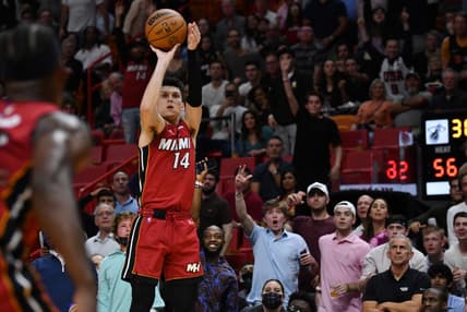 Mar 7, 2022; Miami, Florida, USA; Miami Heat guard Tyler Herro (14) pulls up for a shot against the Houston Rockets during the first half at FTX Arena. Mandatory Credit: Jim Rassol-USA TODAY Sports