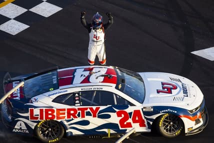 Mar 20, 2022; Hampton, Georgia, USA; NASCAR Cup Series driver William Byron celebrates after winning the Folds of Honor QuikTrip 500 at Atlanta Motor Speedway. Mandatory Credit: Mark J. Rebilas-USA TODAY Sports