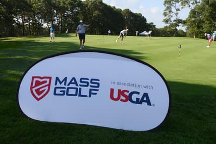 WEST YARMOUTH  8/25/21 Golfers warm up on the practice green at Bayberry Hills Golf Course which hosted a qualifier for the USGA Mid Amateur playing next month on Nantucket. Steve Heaslip/Cape Cod Times