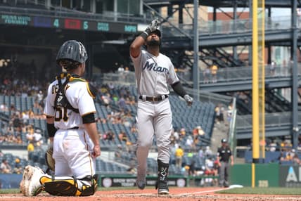 Jul 24, 2022; Pittsburgh, Pennsylvania, USA;  Miami Marlins right fielder Bryan De La Cruz (14) crosses home plate on a solo home run against the Pittsburgh Pirates during the fifth inning at PNC Park. Mandatory Credit: Charles LeClaire-USA TODAY Sports