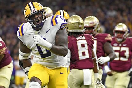 Sep 4, 2022; New Orleans, Louisiana, USA; Louisiana State Tigers defensive tackle Maason Smith (0) celebrates a play during the first half against the Florida State Seminoles at Caesars Superdome. Mandatory Credit: Melina Myers-USA TODAY Sports