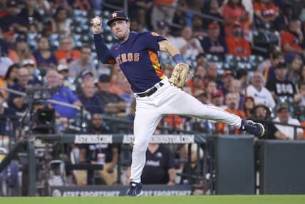 Sep 18, 2022; Houston, Texas, USA; Houston Astros third baseman Alex Bregman (2) throws to first base on a play during the fifth inning against the Oakland Athletics at Minute Maid Park. Mandatory Credit: Troy Taormina-USA TODAY Sports