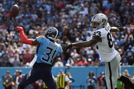Sep 25, 2022; Nashville, Tennessee, USA; Tennessee Titans safety Kevin Byard (31) knocks away the game-tying two-point attempt intended for Las Vegas Raiders tight end Darren Waller (83) during the second half at Nissan Stadium. Mandatory Credit: Christopher Hanewinckel-USA TODAY Sports