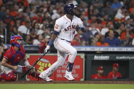 Oct 5, 2022; Houston, Texas, USA; Houston Astros left fielder Yordan Alvarez (44) hits an RBI single during the third inning against the Philadelphia Phillies at Minute Maid Park. Mandatory Credit: Troy Taormina-USA TODAY Sports