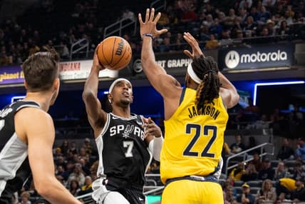 Oct 21, 2022; Indianapolis, Indiana, USA; San Antonio Spurs guard Josh Richardson (7) shoots the ball while Indiana Pacers forward Isaiah Jackson (22) defends  in the first half at Gainbridge Fieldhouse. Mandatory Credit: Trevor Ruszkowski-USA TODAY Sports