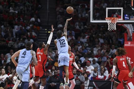 Oct 21, 2022; Houston, Texas, USA; Memphis Grizzlies guard Ja Morant (12) shoots the ball during the fourth quarter against the Houston Rockets at Toyota Center. Mandatory Credit: Troy Taormina-USA TODAY Sports