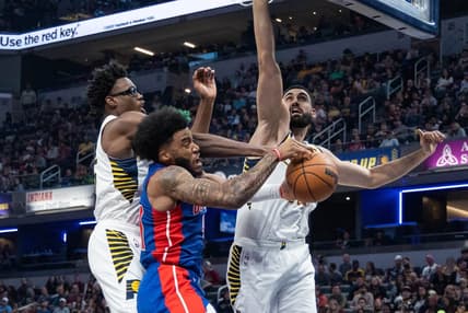 Oct 22, 2022; Indianapolis, Indiana, USA; Detroit Pistons forward Saddiq Bey (41) and Indiana Pacers forward Jalen Smith (25) fight for a rebound in the second quarter at Gainbridge Fieldhouse. Mandatory Credit: Trevor Ruszkowski-USA TODAY Sports