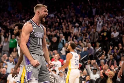 Nov 13, 2022; Sacramento, California, USA; Sacramento Kings forward Domantas Sabonis (10) celebrates after scoring during the fourth quarter against the Golden State Warriors at Golden 1 Center. Mandatory Credit: Ed Szczepanski-USA TODAY Sports