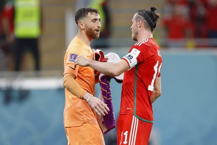 Nov 21, 2022; Al Rayyan, Qatar; United States of America goalkeeper Matt Turner (1) talks with Wales forward Gareth Bale (11) after a group stage match during the 2022 FIFA World Cup at Ahmed Bin Ali Stadium. Mandatory Credit: Yukihito Taguchi-USA TODAY Sports