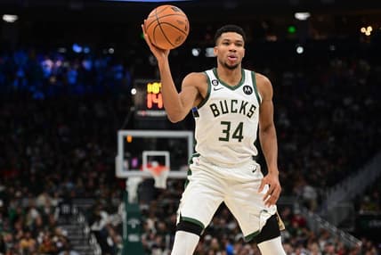 Nov 21, 2022; Milwaukee, Wisconsin, USA; Milwaukee Bucks forward Giannis Antetokounmpo (34) looks to pass the ball in the second quarter during game against the Portland Trail Blazers at Fiserv Forum. Mandatory Credit: Benny Sieu-USA TODAY Sports