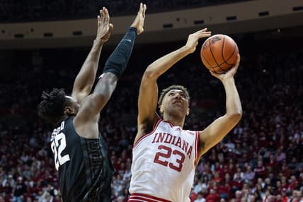 Jan 22, 2023; Bloomington, Indiana, USA; Indiana Hoosiers forward Trayce Jackson-Davis (23) shoots the ball while Michigan State Spartans center Mady Sissoko (22) defends in the first half at Simon Skjodt Assembly Hall. Mandatory Credit: Trevor Ruszkowski-USA TODAY Sports