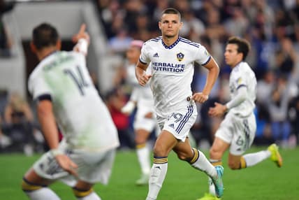 Oct 20, 2022; Los Angeles, California, US; Los Angeles Galaxy forward Dejan Joveljic (99) reacts after scoring a goal during the second half of the MLS Cup Playoff semifinal against the Los Angeles FC at Banc Of California Stadium. Mandatory Credit: Gary A. Vasquez-USA TODAY Sports