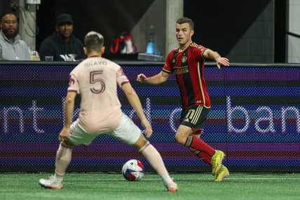 Mar 18, 2023; Atlanta, Georgia, USA; Portland Timbers starting eleven stand with youth players during the Nation Anthem prior to the match against the Atlanta United at Mercedes-Benz Stadium. Mandatory Credit: Brett Davis-USA TODAY Sports