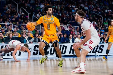 Mar 17, 2023; Albany, NY, USA; Kent State Golden Flashes guard Sincere Carry (3) controls the ball as Indiana Hoosiers forward Race Thompson (25) guards in the second half at MVP Arena. Mandatory Credit: Gregory Fisher-USA TODAY Sports