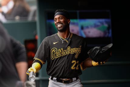 Apr 19, 2023; Denver, Colorado, USA; Pittsburgh Pirates designated hitter Andrew McCutchen (22) reacts in the dugout after hitting a solo home run in the second inning against the Colorado Rockies at Coors Field. Mandatory Credit: Isaiah J. Downing-USA TODAY Sports